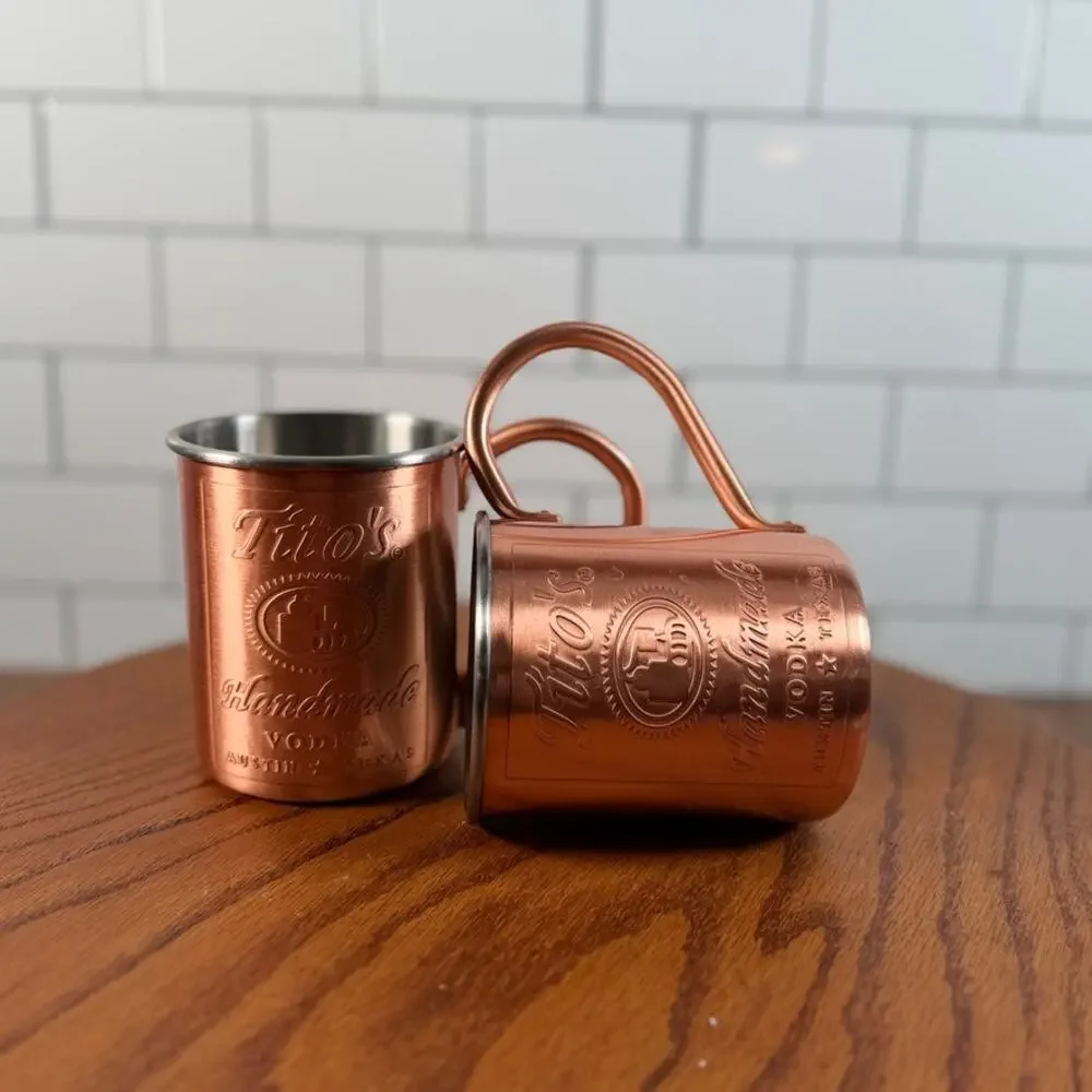 Pair of Tito's Handmade Vodka Copper Moscow Mule Mugs Lined 12oz